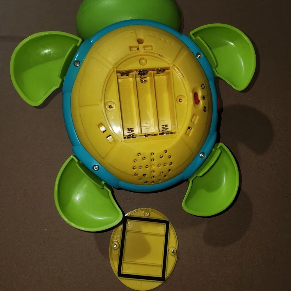 Baby Einstein Neptune Musical Turtle Toy Lights and Sounds Green Interactive